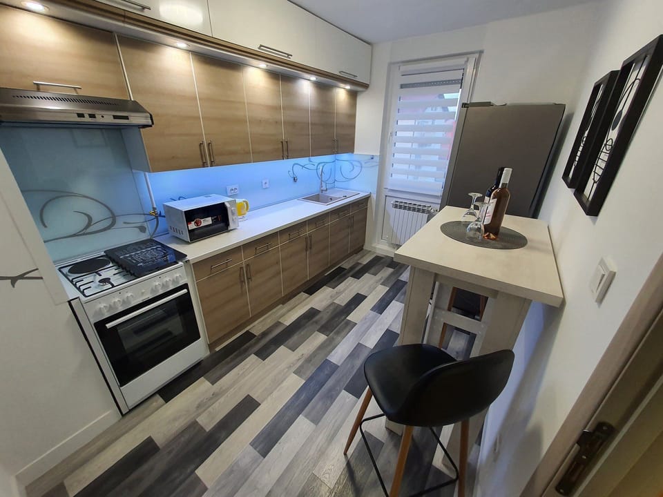 Apartment (One Bedroom Apartment with Balcony) | Private kitchen | Fridge