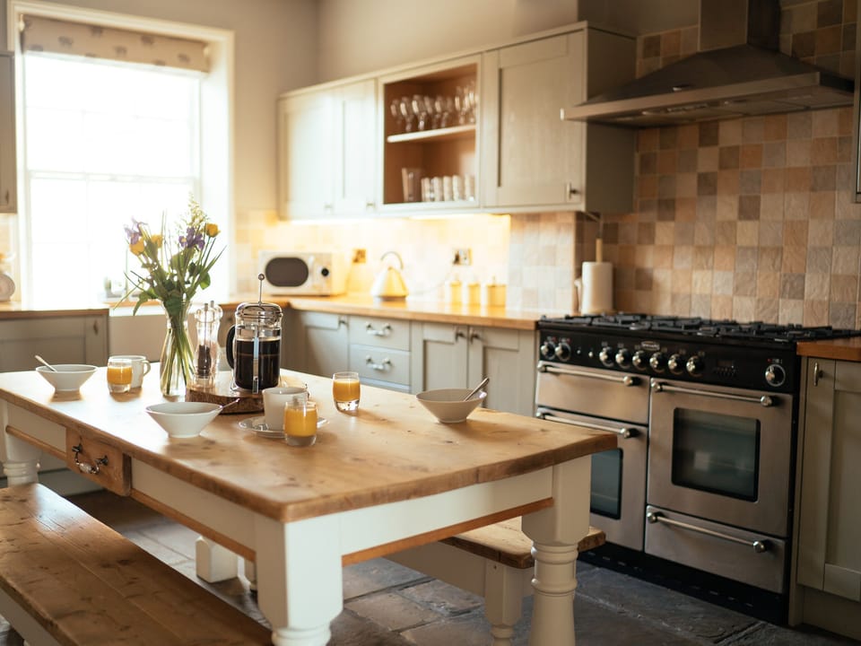 Fridge, electric kettle, toaster, cookware/dishes/utensils