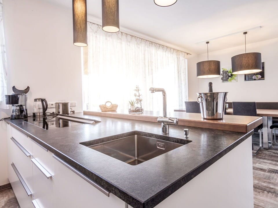 Sink, Tap, Kitchen Sink, Countertop, Cabinetry, Property, Plumbing Fixture, Wood, Kitchen, Lighting