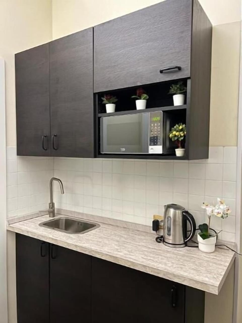 Full-size fridge, espresso maker, electric kettle, toaster