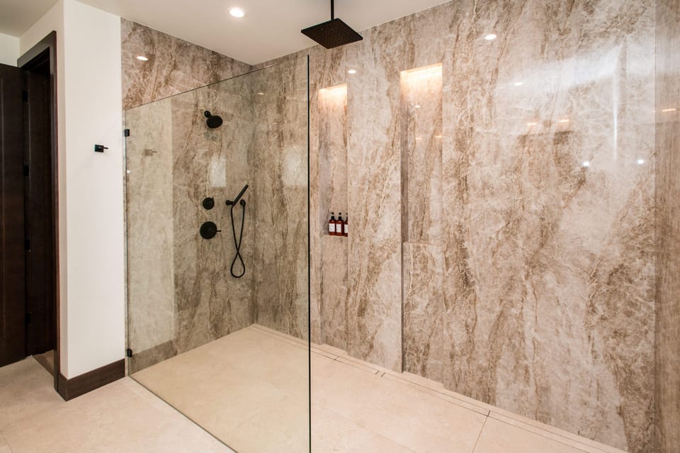 Massive walk-in shower with rain shower and stunning finishes