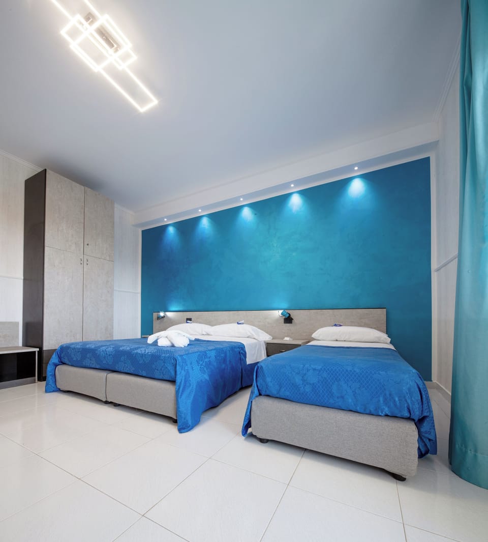 Junior Studio Suite, Sea View | Minibar, desk, laptop workspace, cribs/infant beds