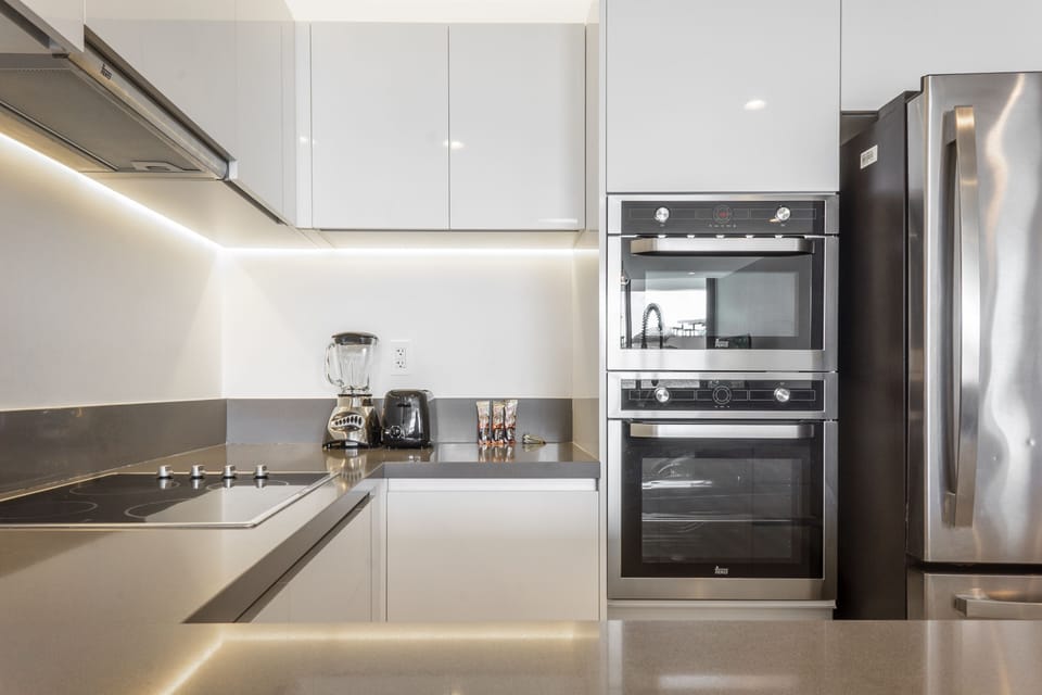 Luxury Apartment | Private kitchen | Full-size fridge, microwave, oven, stovetop