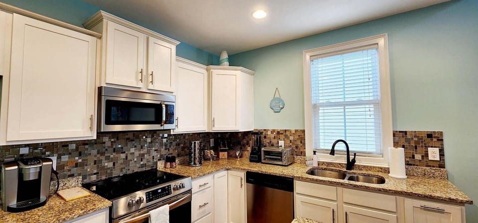 Kitchen with Granite Countertops Keurig Coffee Machine and Toaster