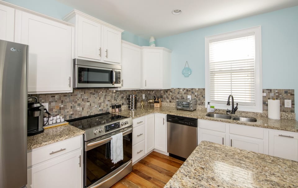 NEW Microwave and Stainless Steel Appliances