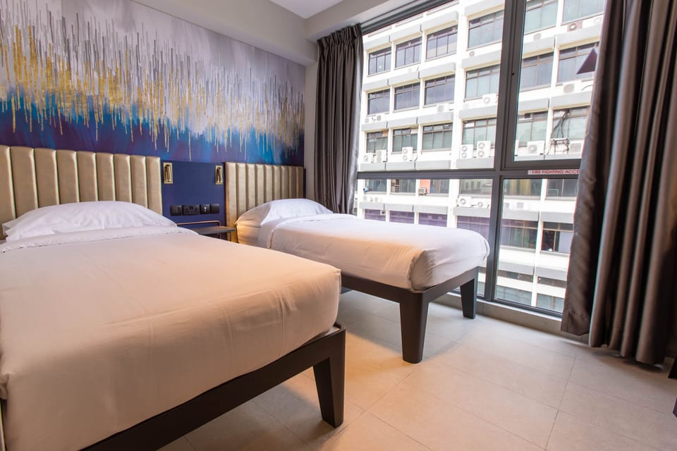 Deluxe Room, 2 Twin Beds | In-room safe, desk, blackout drapes, iron/ironing board (on request)