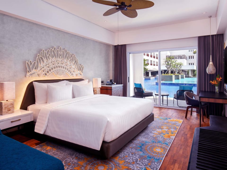 Deluxe Room, 1 King Bed, Pool Access | In-room safe, desk, laptop workspace, iron/ironing board