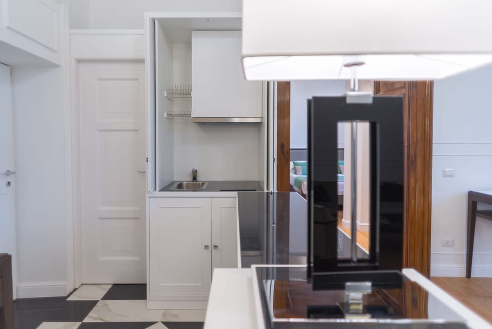 Superior Suite, 2 Bedrooms, City View | Private kitchen | Fridge, espresso maker, electric kettle