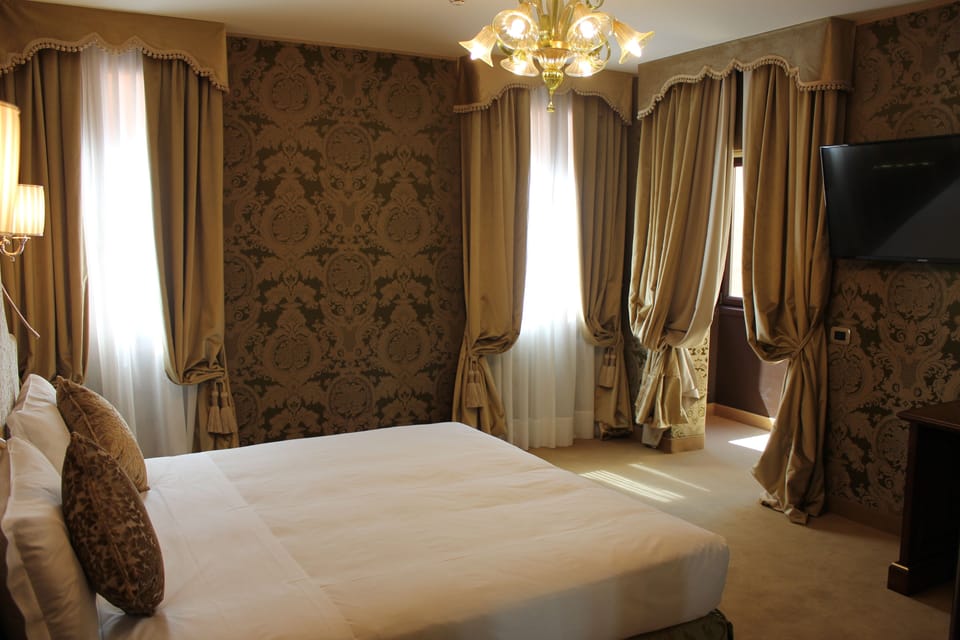 Down comforters, in-room safe, desk, soundproofing