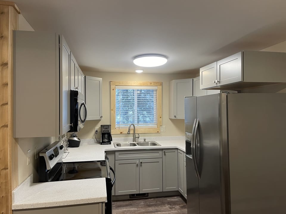 Fully stocked kitchen with dishwasher
