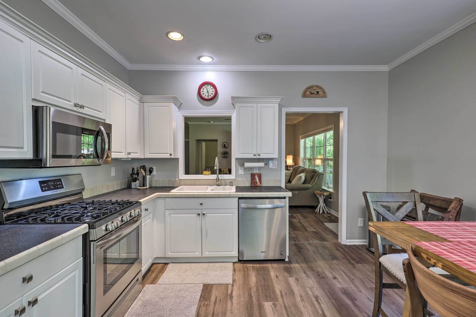 Gas stove, microwave and dishwasher. 