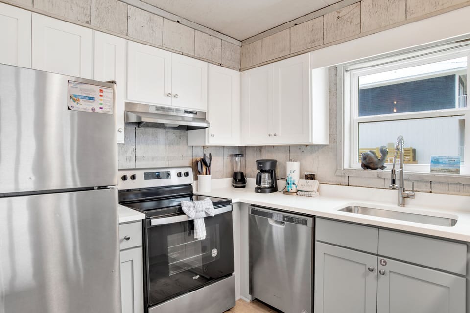 Fully equipped kitchen with stainless steel appliances