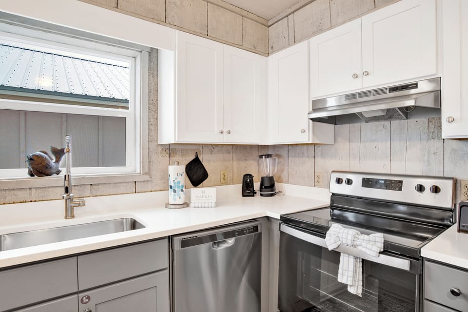 Fully equipped kitchen with stainless steel appliances