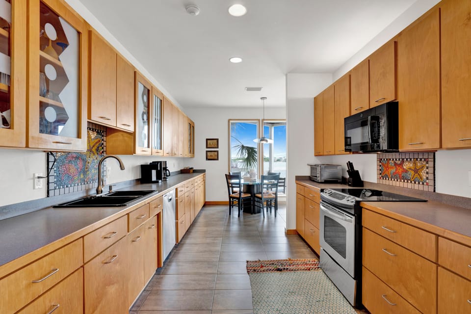 Featuring a full kitchen and kitchenette, each fully equipped for all of your cooking needs