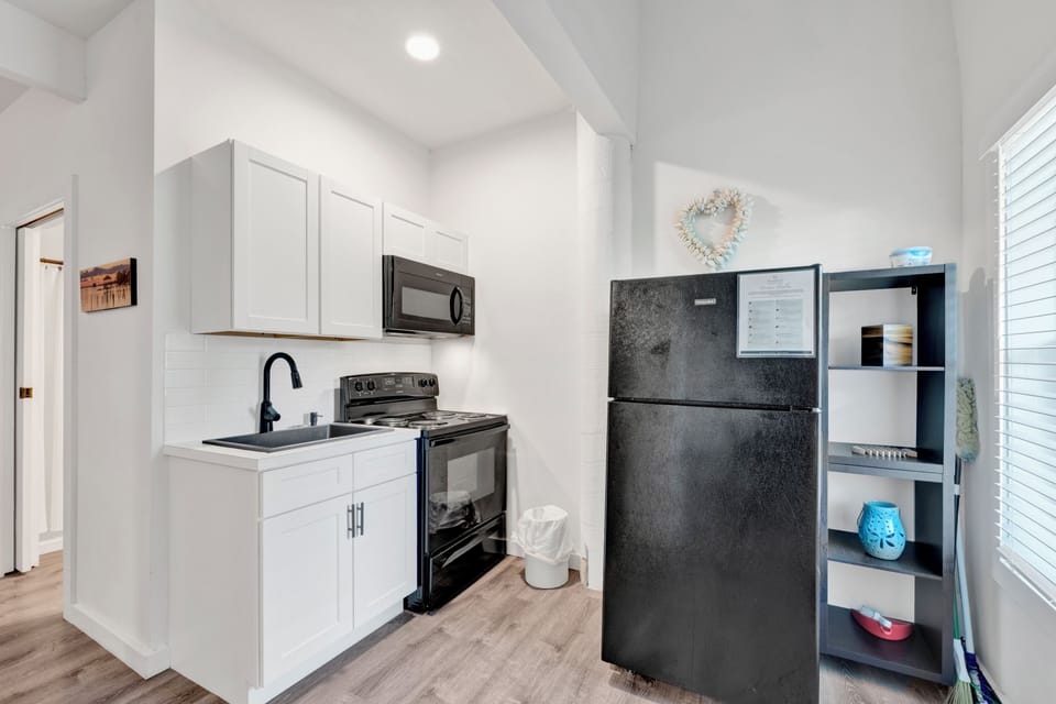 The kitchenette features full size appliances