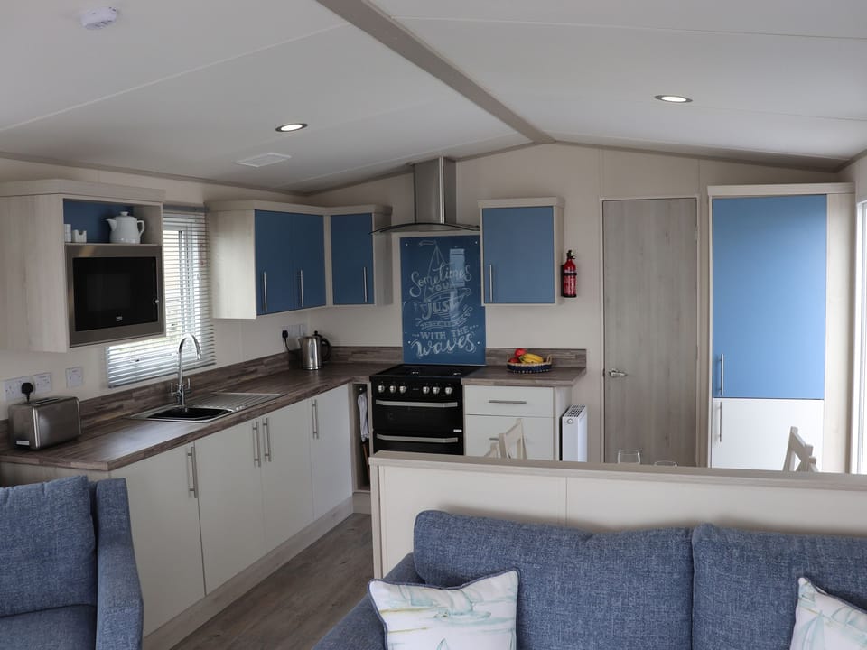 Fridge, electric kettle, toaster, cookware/dishes/utensils