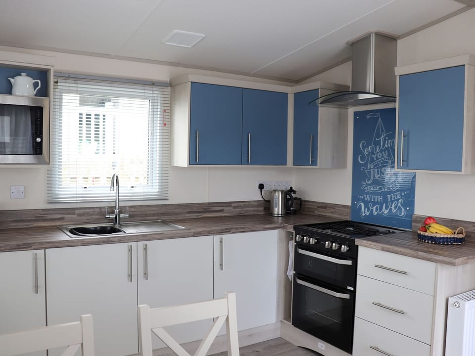 Fridge, electric kettle, toaster, cookware/dishes/utensils