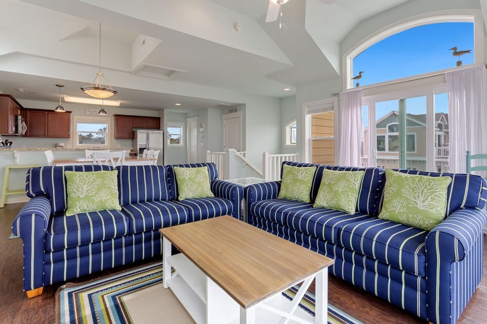 Watch Your Favorite Shows or Relax with a Beach Read in the Top-Level Living Area