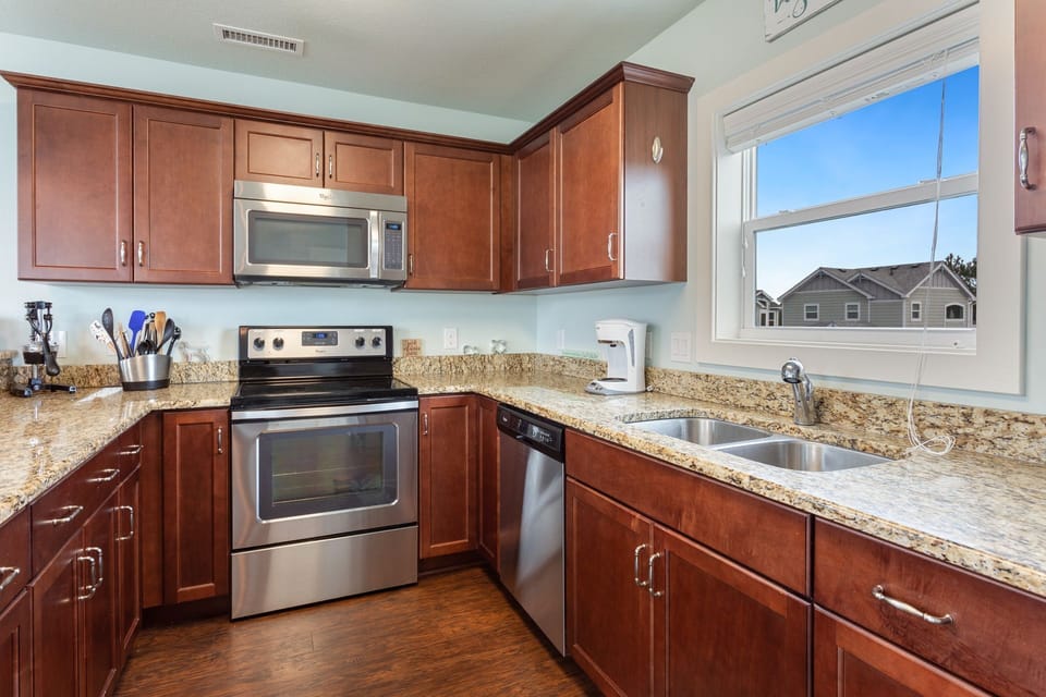 Modern Kitchen with Beautiful Cabinetry is Perfect for a Vacation Meal Everyone Will Love