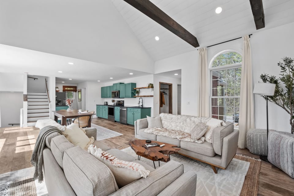 Open concept living room/kitchen/dining area