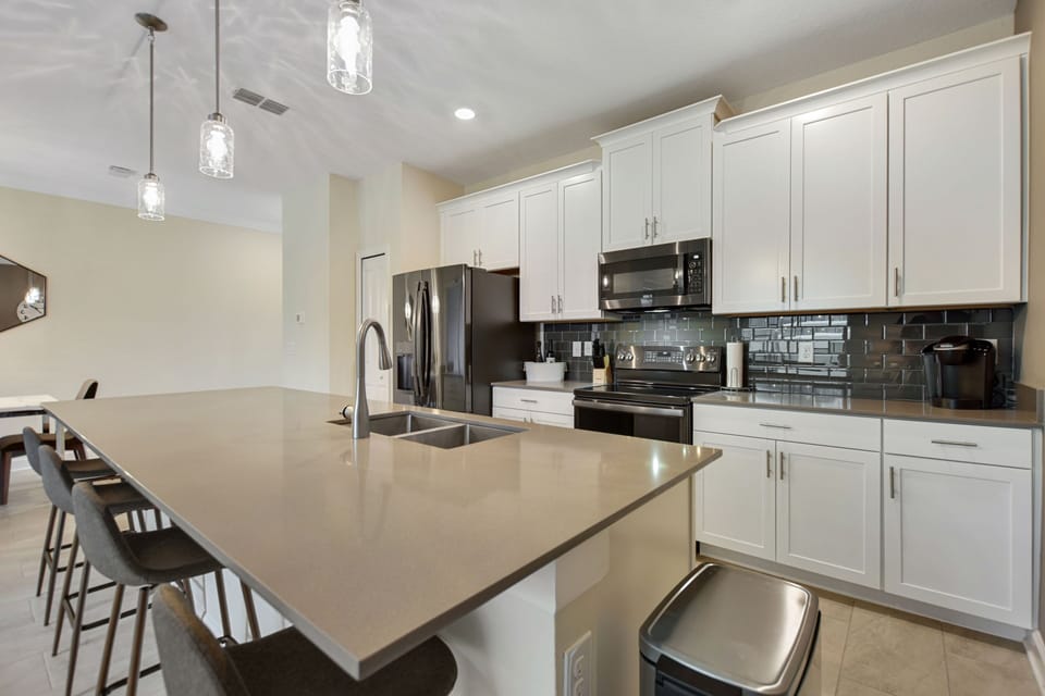 Townhome, 4 Bedrooms | Private kitchen | Coffee/tea maker, fridge, oven, toaster