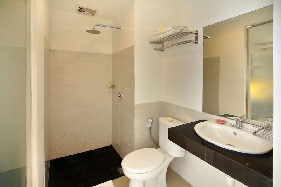 Shower, free toiletries, hair dryer, slippers