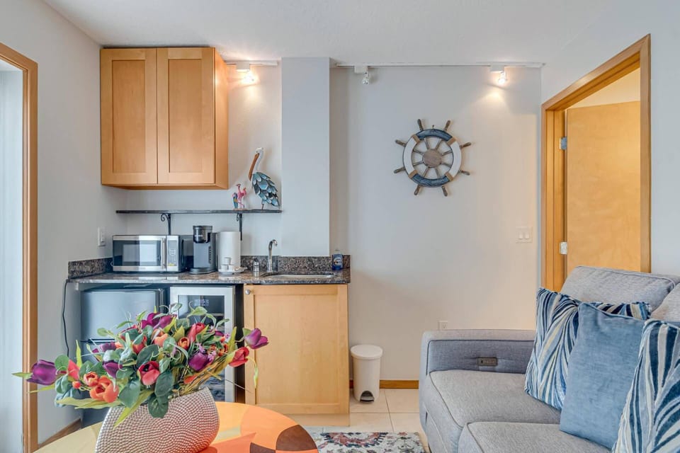 Enjoy the convenience of our kitchenette, featuring a Mini-Fridge, Wine Cooler, Microwave, Cook Top, Coffee Maker, Dishware and Utensils.