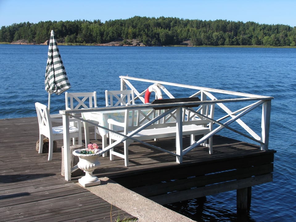 Seaside century house with beautiful sunset and big jetty with sauna  Cottage in Stockholm County