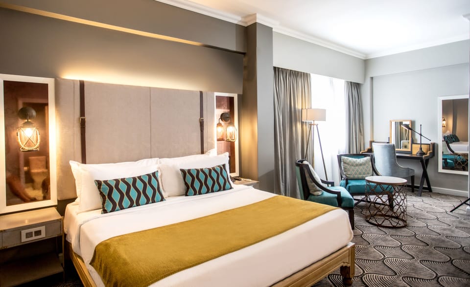 Executive King Room | Minibar, in-room safe, desk, blackout drapes