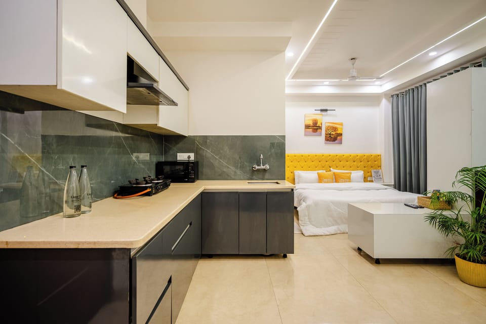 Deluxe Studio | Premium bedding, desk, laptop workspace, iron/ironing board