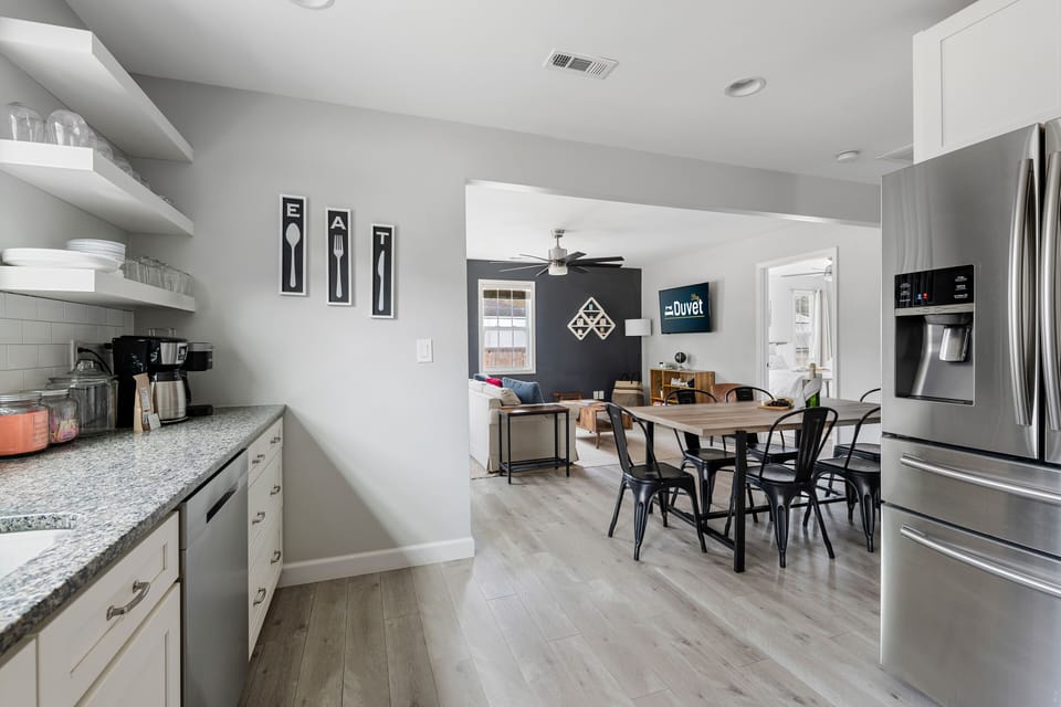 Dining Table flows into Kitchen