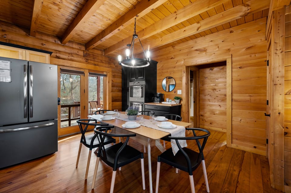 Through the backdoor, you can get to the hot tub and outdoor dining area. 
