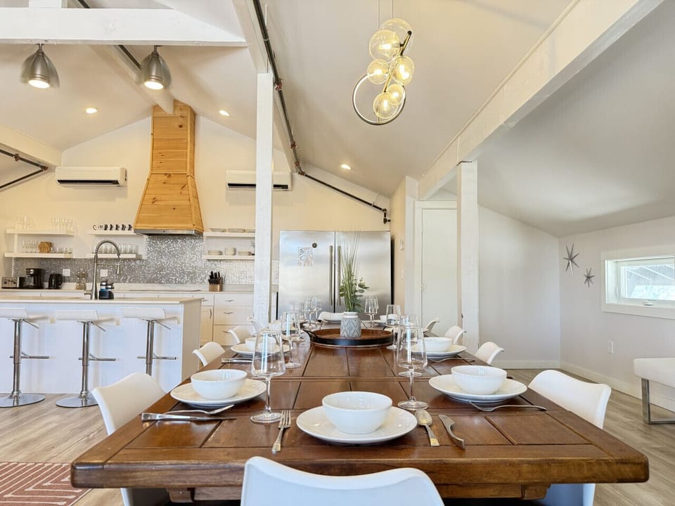 Bright dining area with modern chairs and open layout.