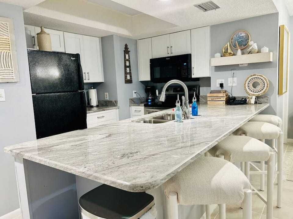 Kitchen with bar and seating
