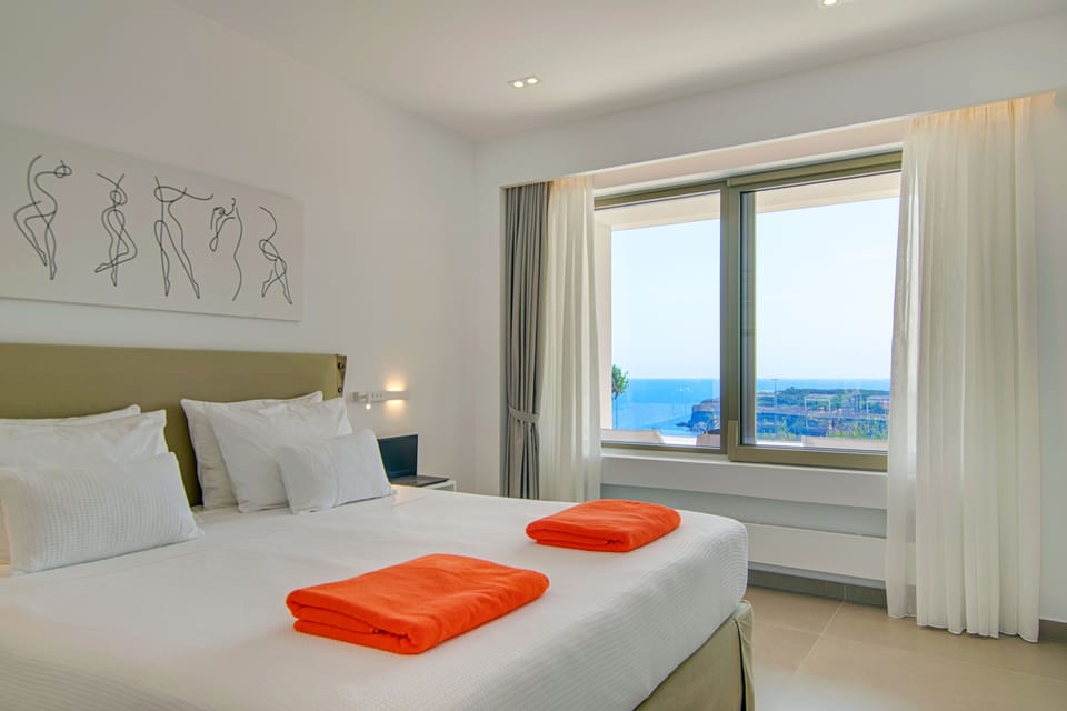 Superior Suite, Hot Tub, Pool View | Free minibar, in-room safe, laptop workspace, blackout drapes