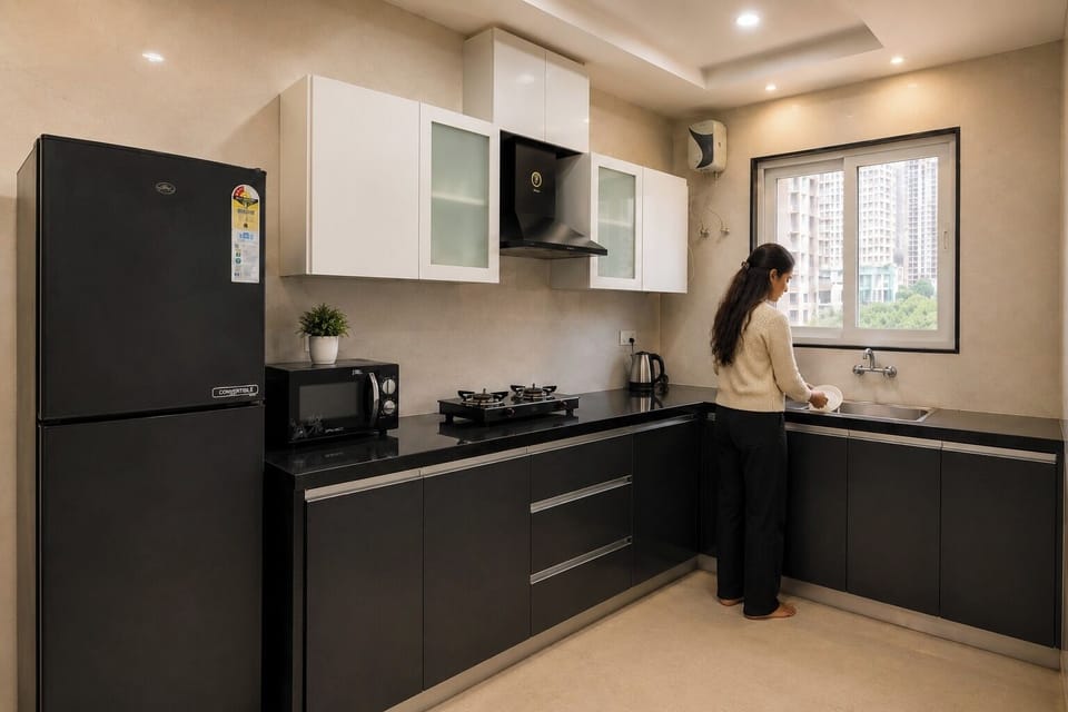 Comfort Apartment | Private kitchen | Fridge, microwave, cookware/dishes/utensils, freezer