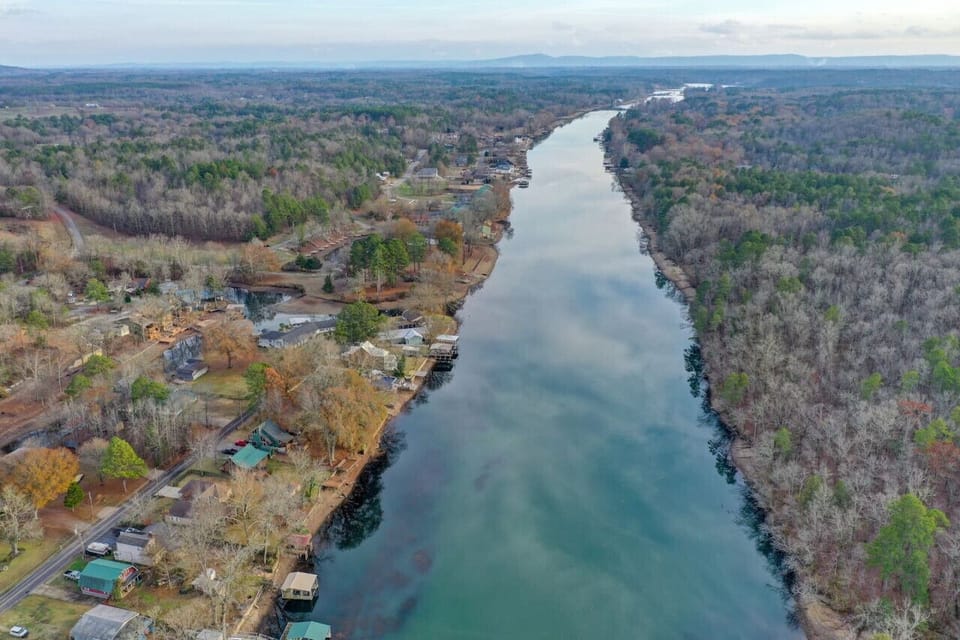 Peaceful riverside community surrounded by nature.
