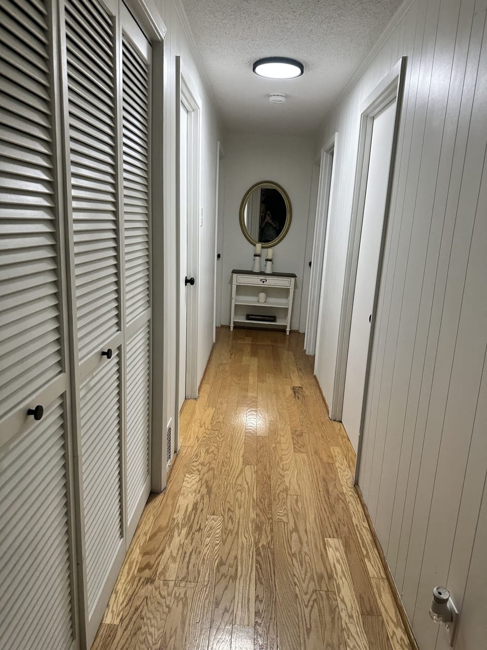 Hallway with Laundry closet on left