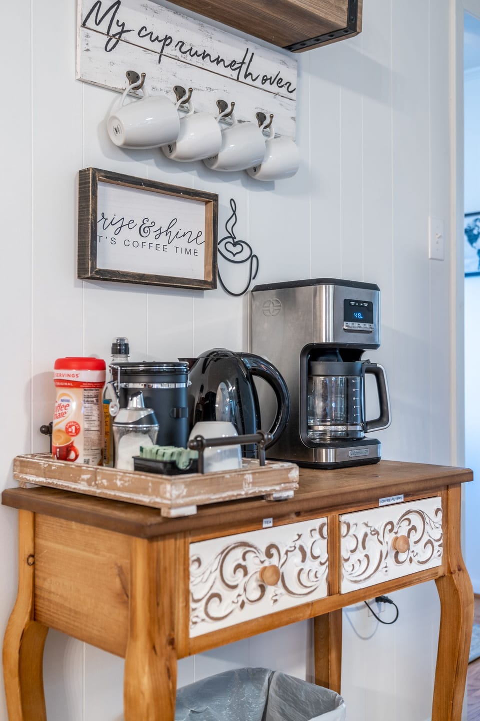 Coffee Bar with coffee pot, electric kettle, tea, coffee and condiments