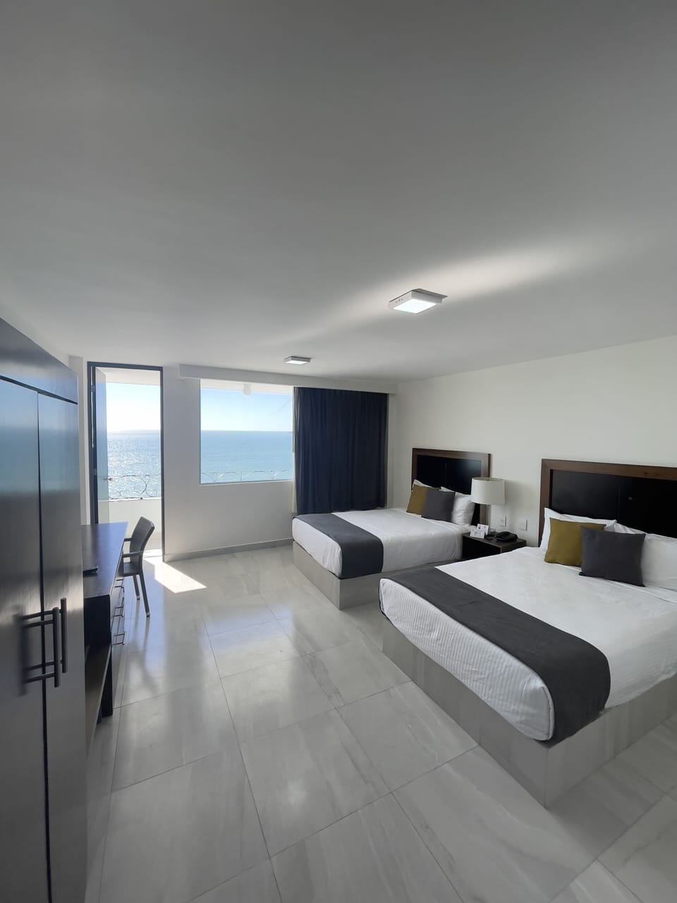 Quadruple Room | In-room safe, desk, free WiFi, bed sheets