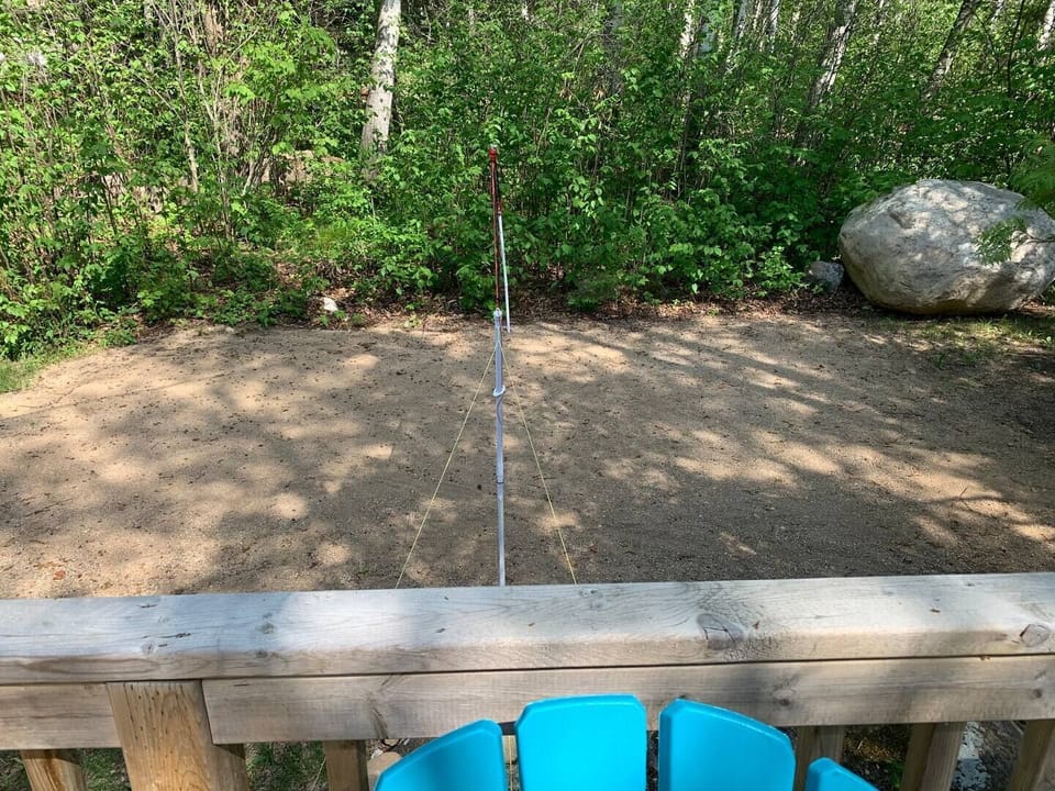 Badminton/volleyball net and accessories are right in the yard!