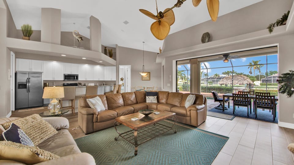 Living room with view to pool deck