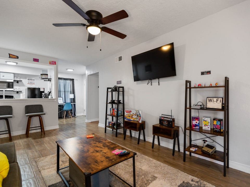 50 inches TV and sets of games for you and your family.