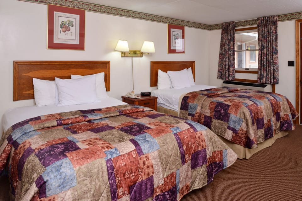Standard Room, 2 Queen Beds | Iron/ironing board, free WiFi, bed sheets