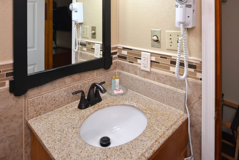Room, 1 King Bed | Bathroom sink
