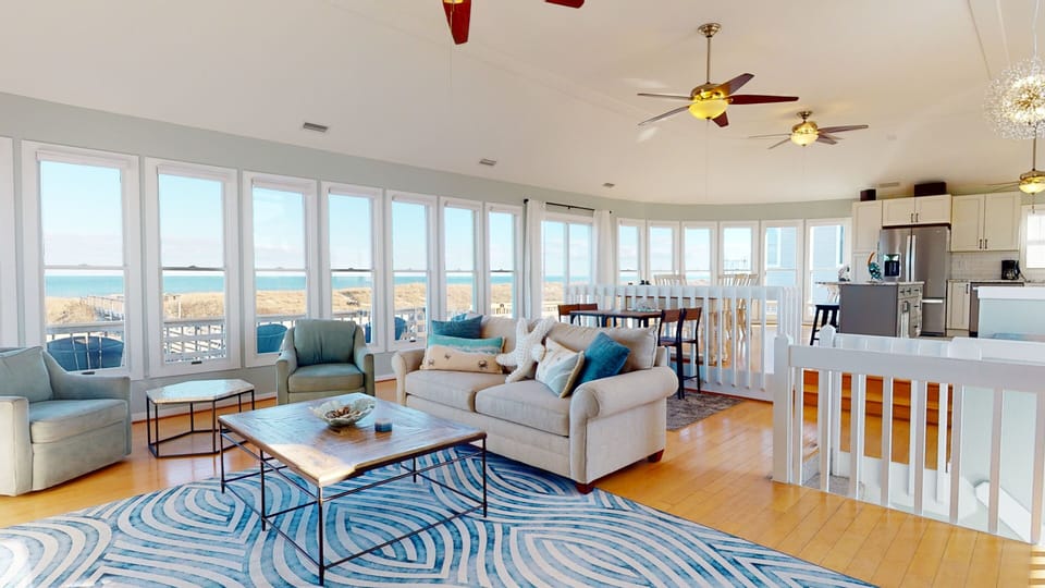Living room looking east, dining room behind - Living room looking east, dining room behind