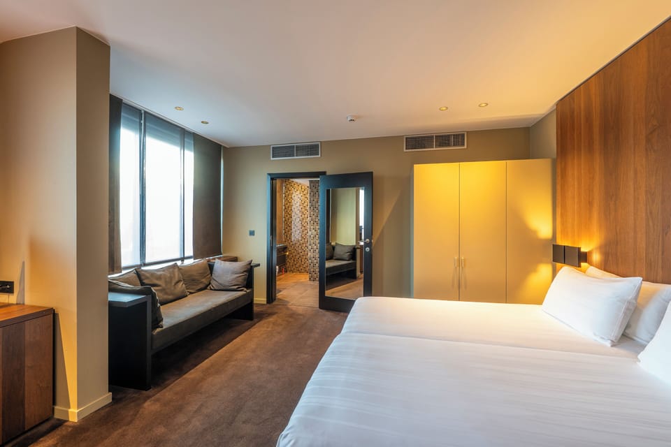 Deluxe Double Room | In-room safe, desk, laptop workspace, blackout drapes