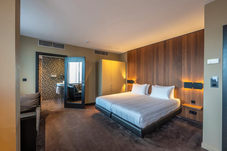 Deluxe Double Room | In-room safe, desk, laptop workspace, blackout drapes
