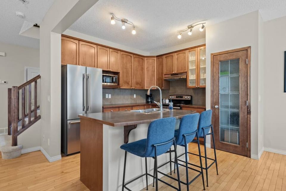 Full kitchen with a drip coffee machine, ground coffee, tea, sugar and basic condiments (ketchup, mustard and relish.)