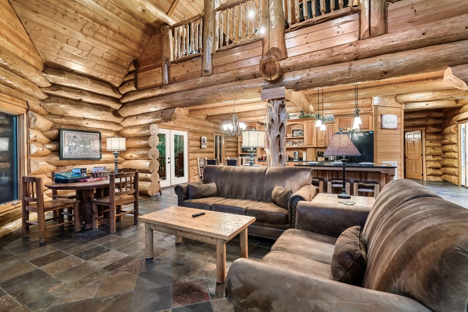 Large Open Living Area w/ Plenty of Seating for the Whole Group SmartTV and Table for Game Night!